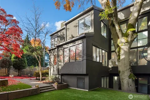 a view of a building with a yard