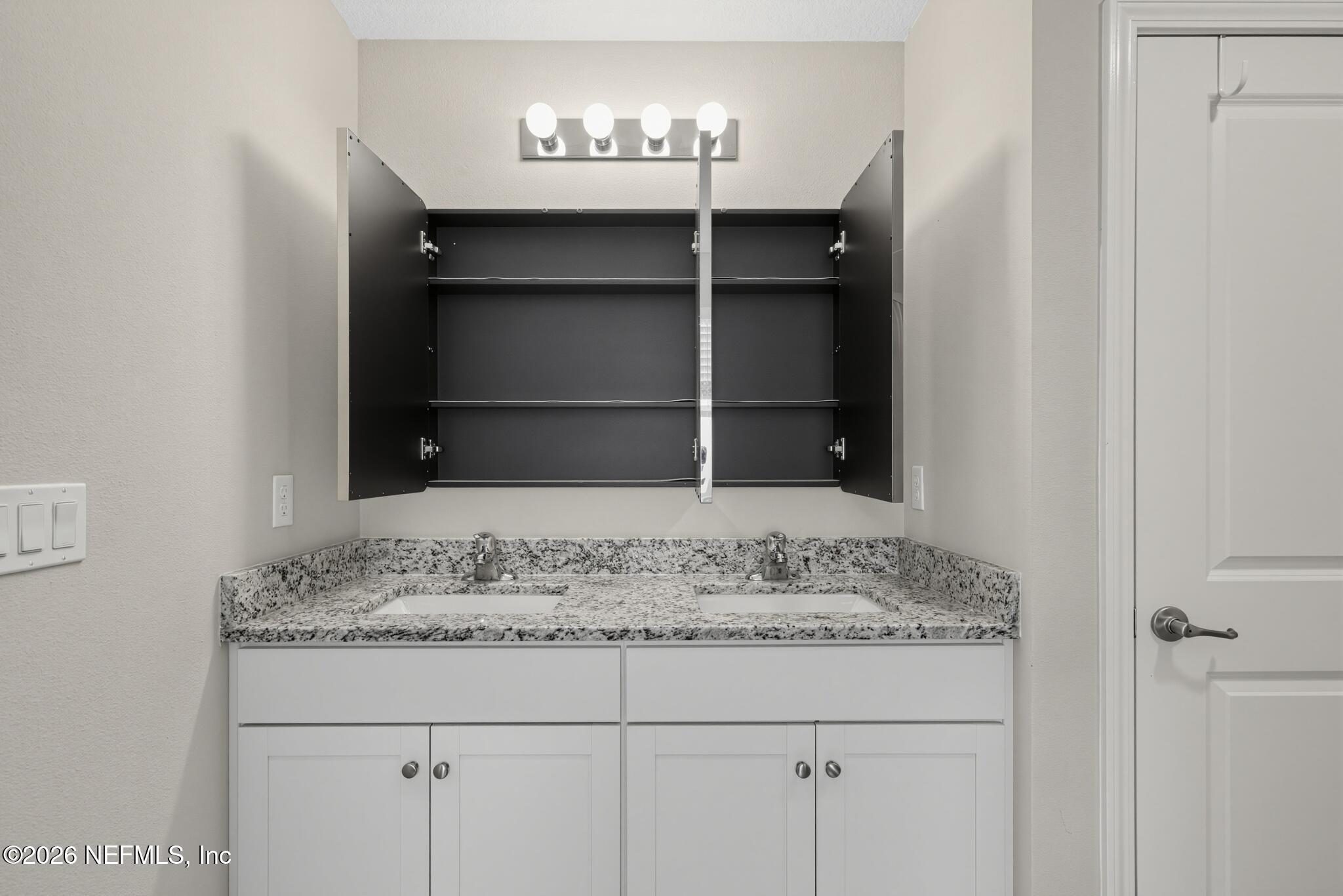 331 Meadow Ridge Drive St. Augustine, FL 32092 - Photo 22 of 36 25_331_Meadow_Ridge_Dr-Bathroom-7814