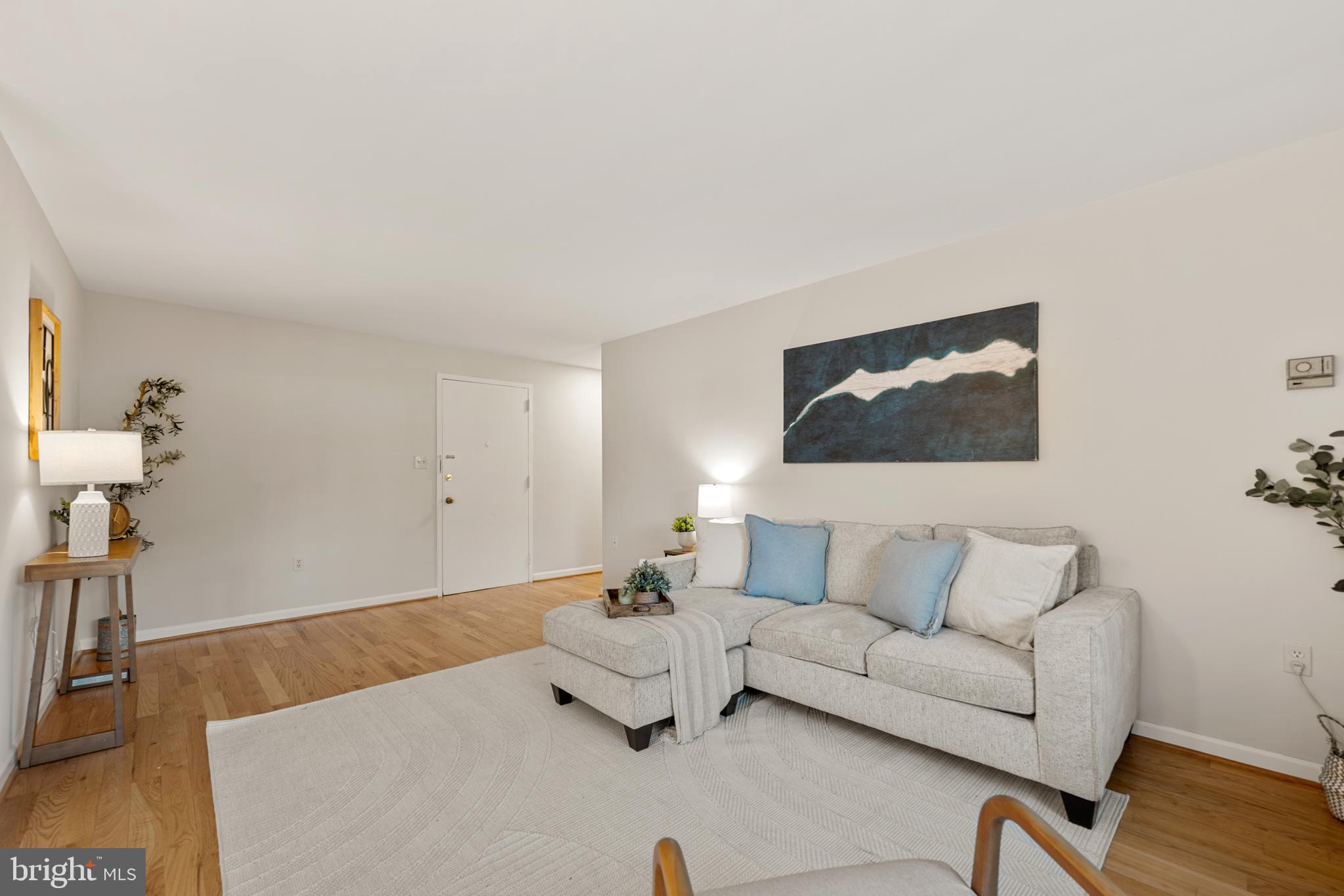 1300 South Arlington Ridge Road, Unit 314 Arlington, VA 22202 - Photo 4 of 31 Light-Filled Living Room