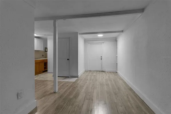 a kitchen with a stove and a sink