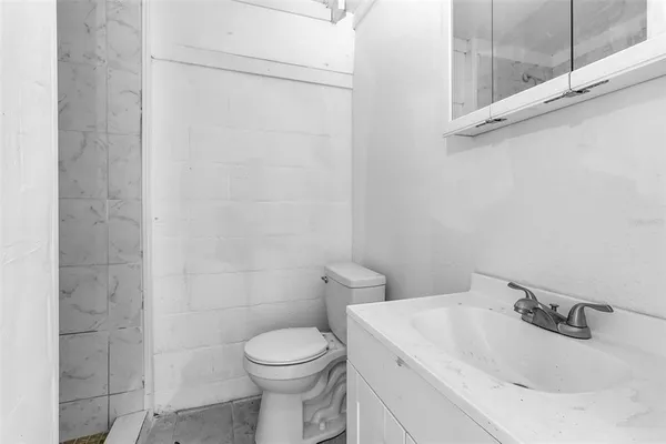 a backyard of a house with garage