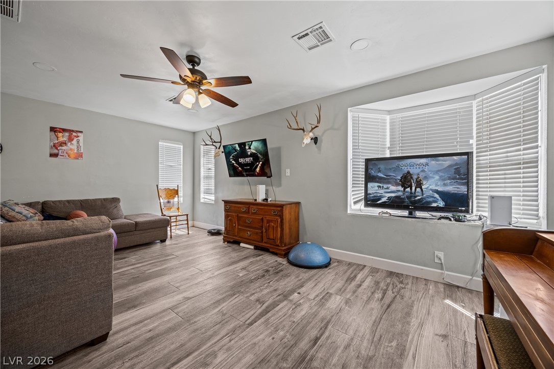 750 Leming Avenue Overton, NV 89040 - Photo 19 of 82 This living room features ample natural light and durable flooring, perfect for comfortable daily living.