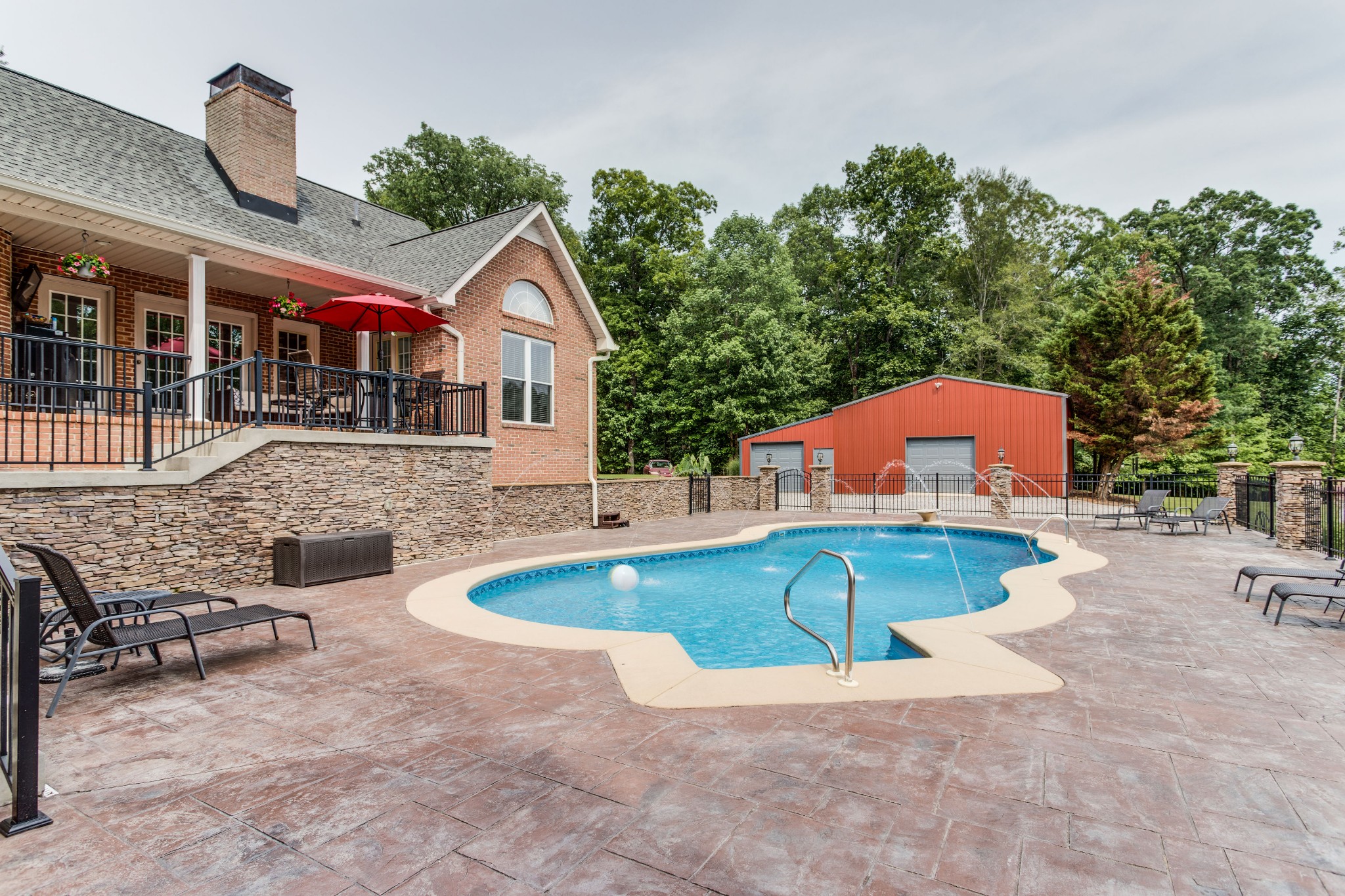 844 Ed Sanders Road Lynchburg, TN 37352 - Photo 37 of 46 an outdoor space with swimming pool and furniture