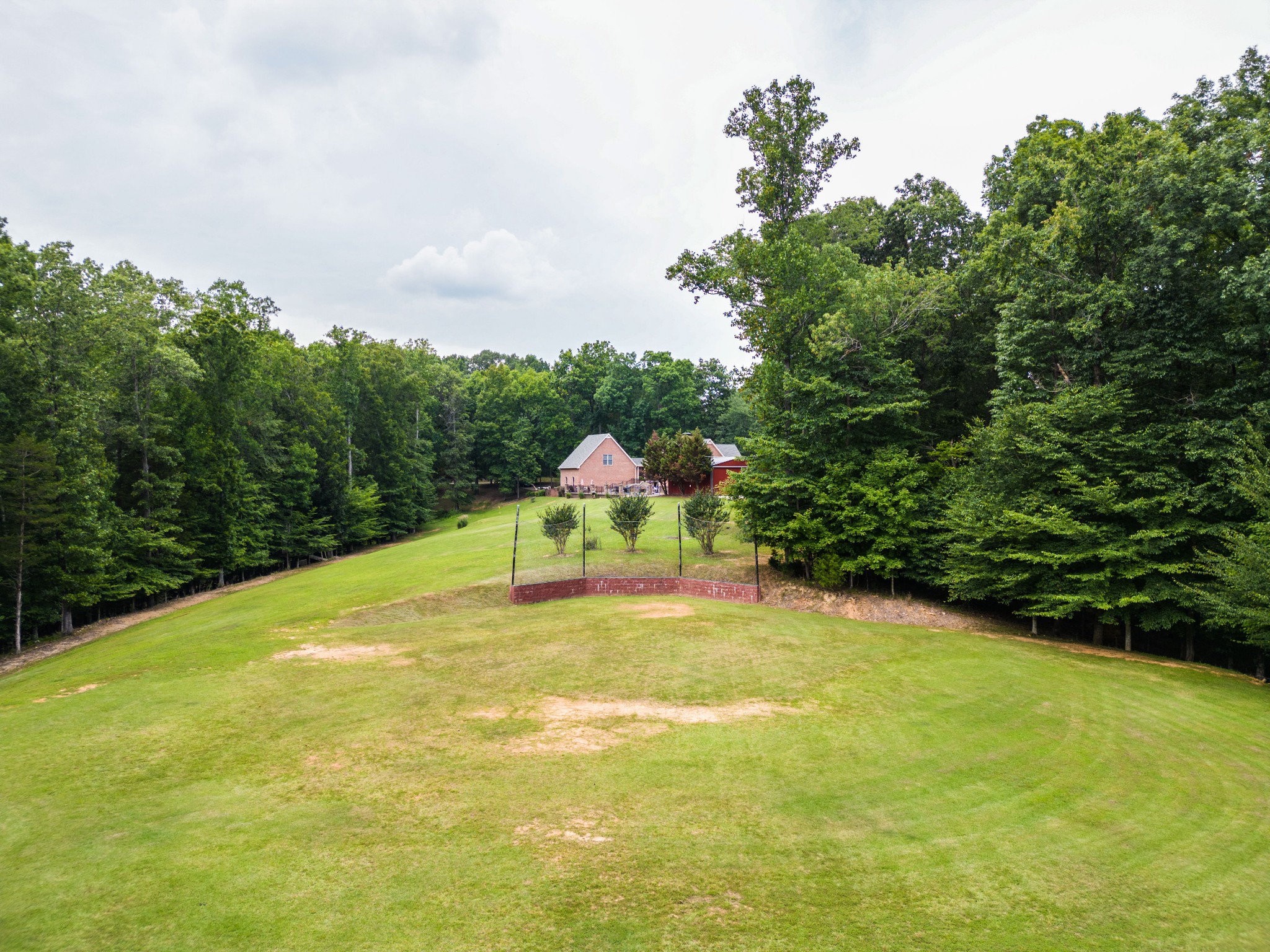 844 Ed Sanders Road Lynchburg, TN 37352 - Photo 9 of 46 a swimming pool with trees in the background
