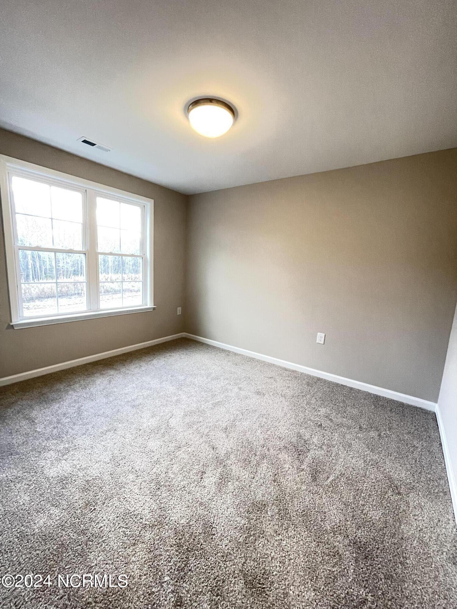 85 Morningdew Way Spring Hope, NC 27882 - Photo 21 of 21 One of 2 upstairs bedrooms