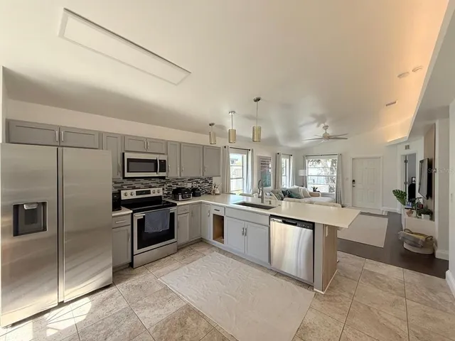 a large kitchen with cabinets
