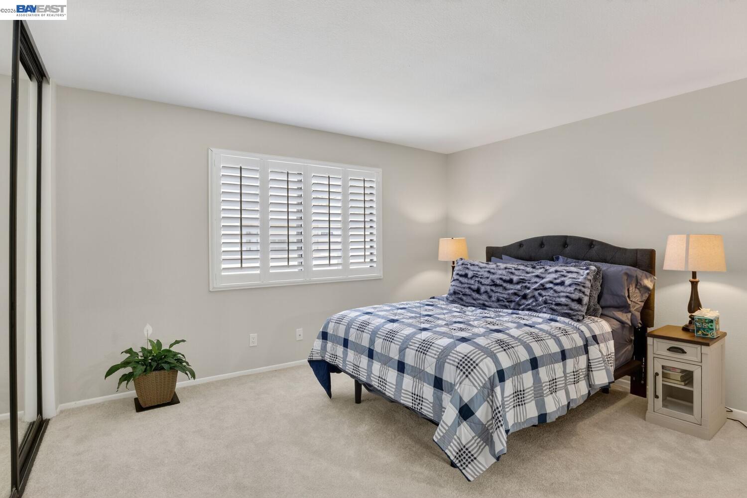 218 Apollo, Unit 3 Hercules, CA 94547 - Photo 18 of 36 Spacious primary bedroom with plantation shutters and new carpet.