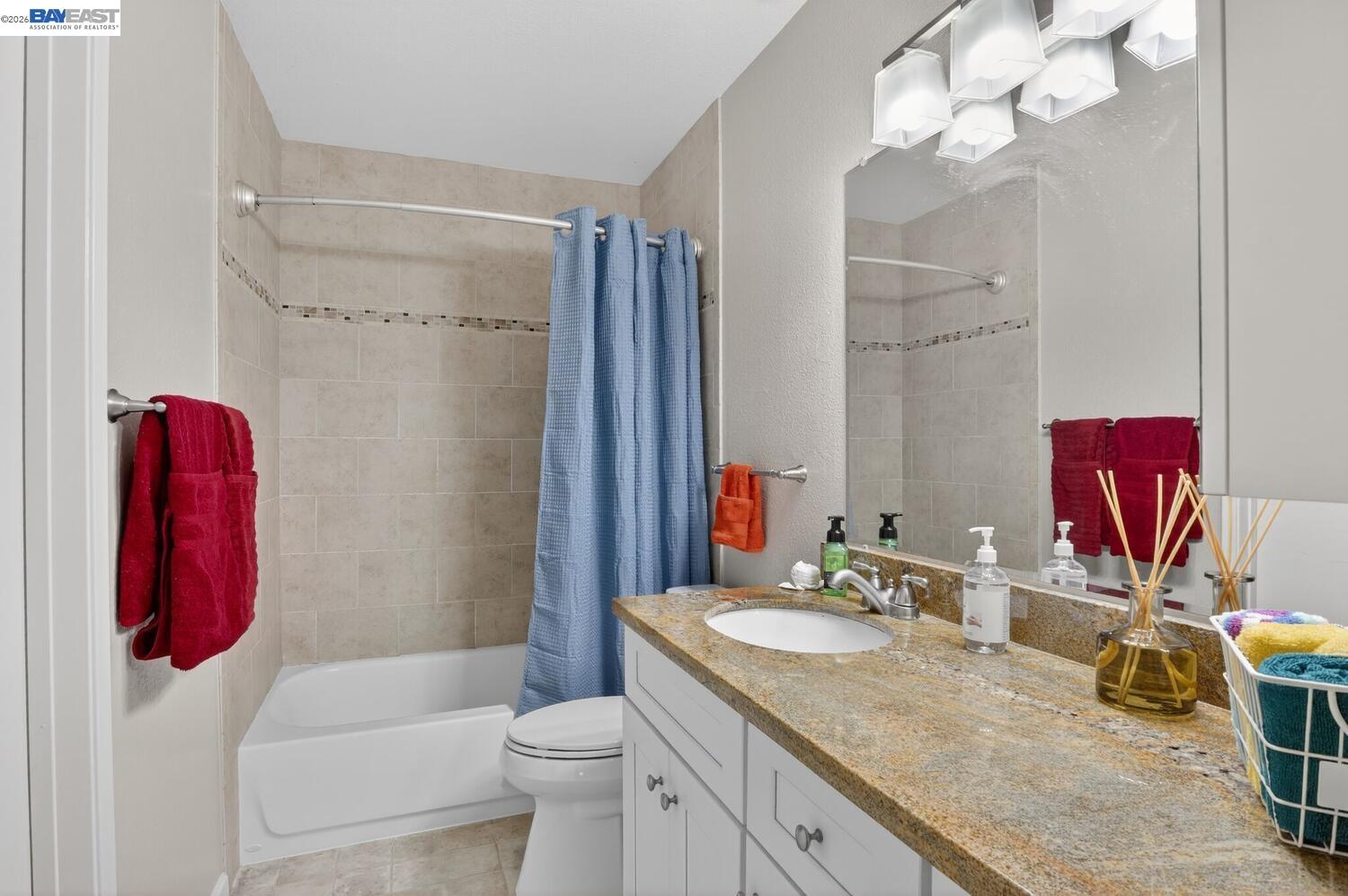 218 Apollo, Unit 3 Hercules, CA 94547 - Photo 26 of 36 Granite countertops, updated vanity, shower/tub with stylish tile surrounding.