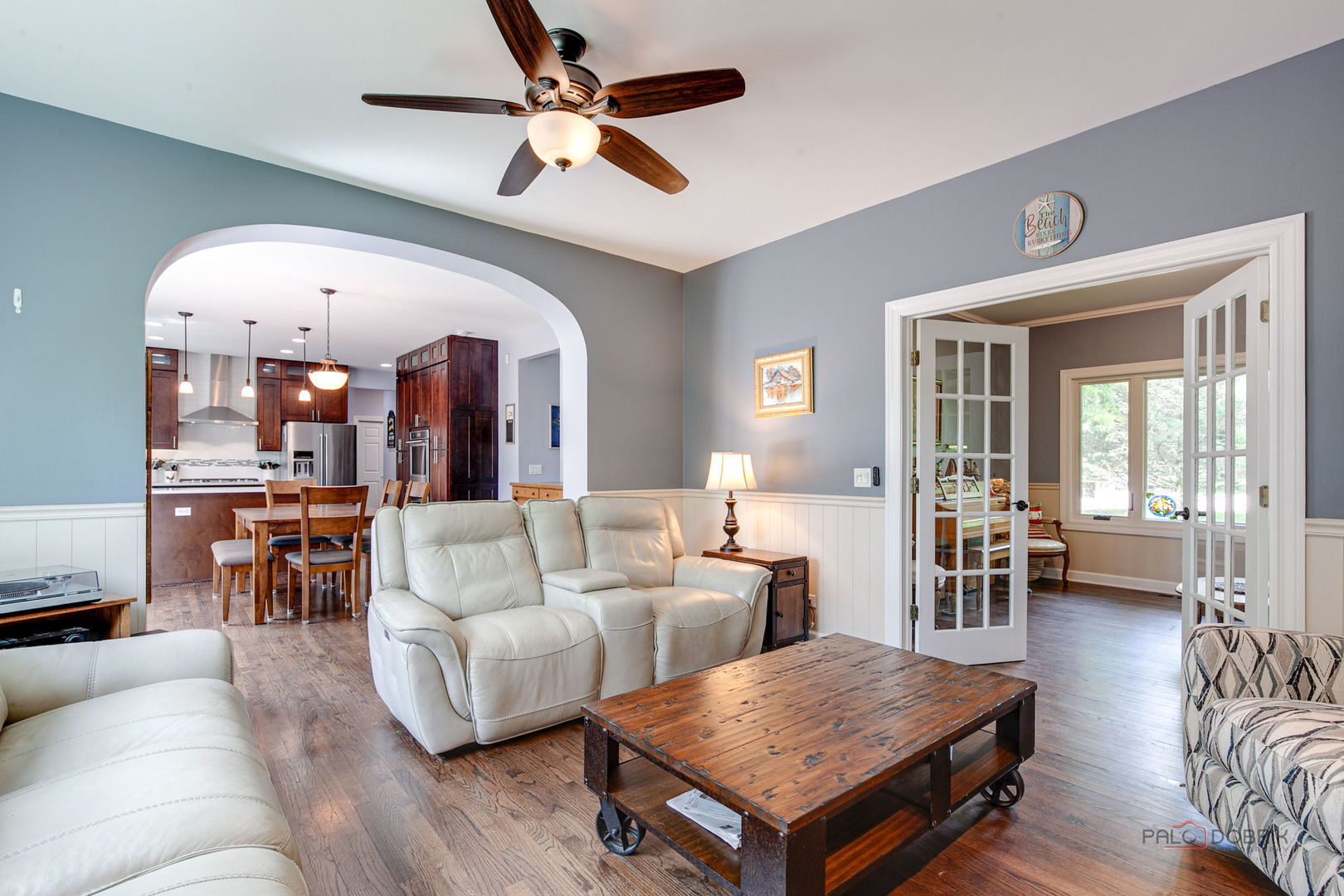 3313 Ridge Road Spring Grove, IL 60081 - Photo 15 of 49 a living room with furniture and a chandelier