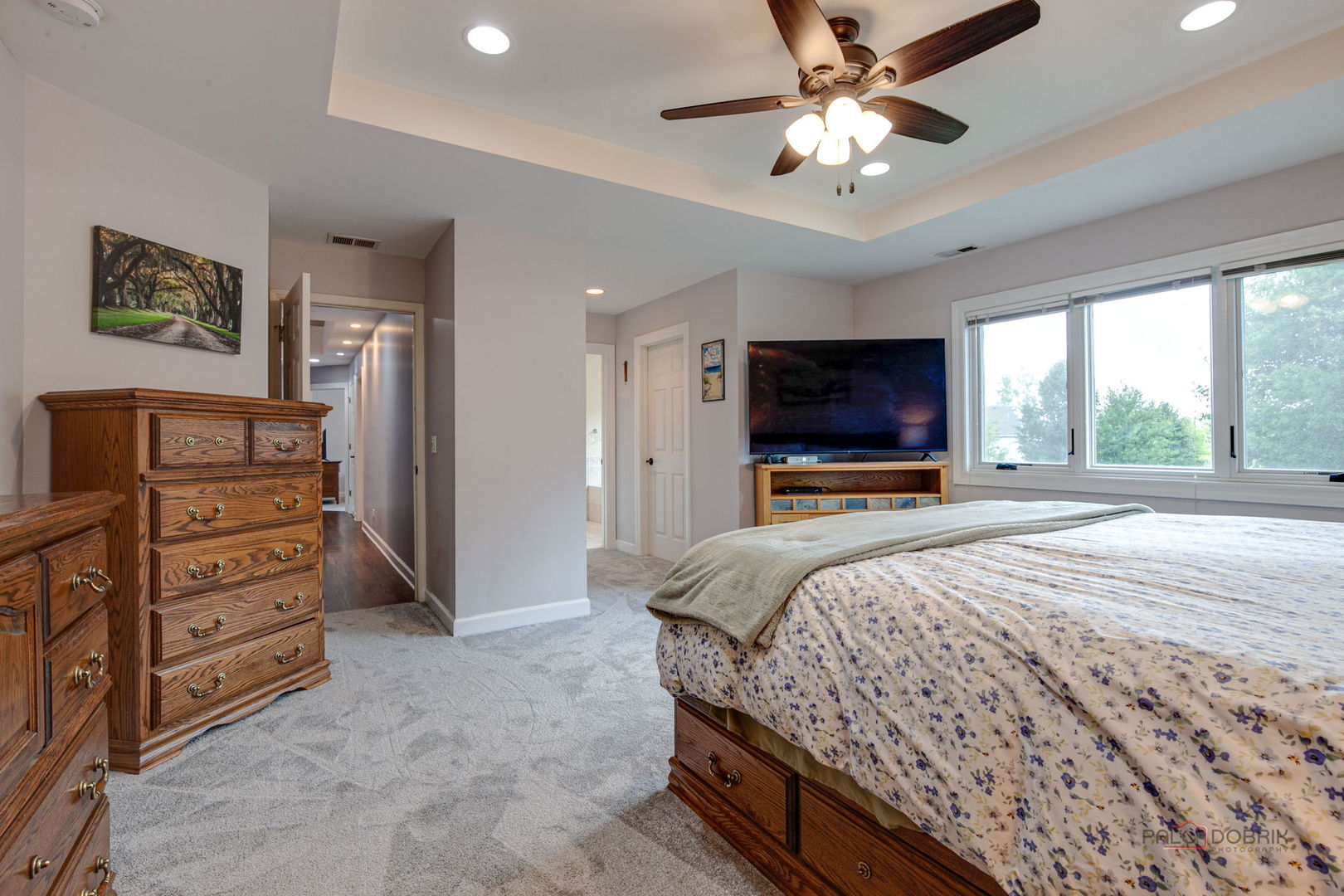 3313 Ridge Road Spring Grove, IL 60081 - Photo 25 of 49 a bedroom with a bed and a flat screen tv