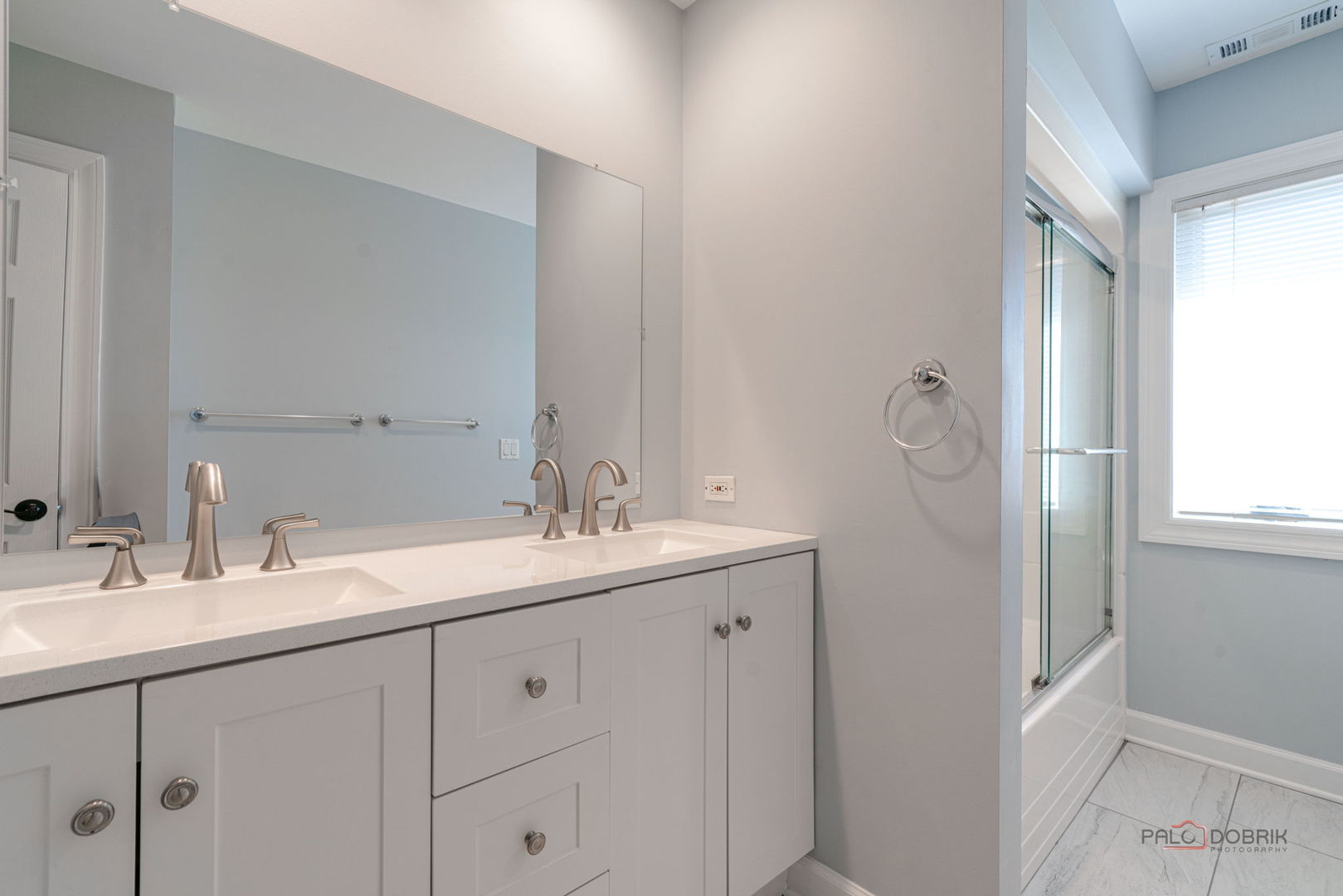 3313 Ridge Road Spring Grove, IL 60081 - Photo 33 of 49 a bathroom with a double vanity sink and mirror