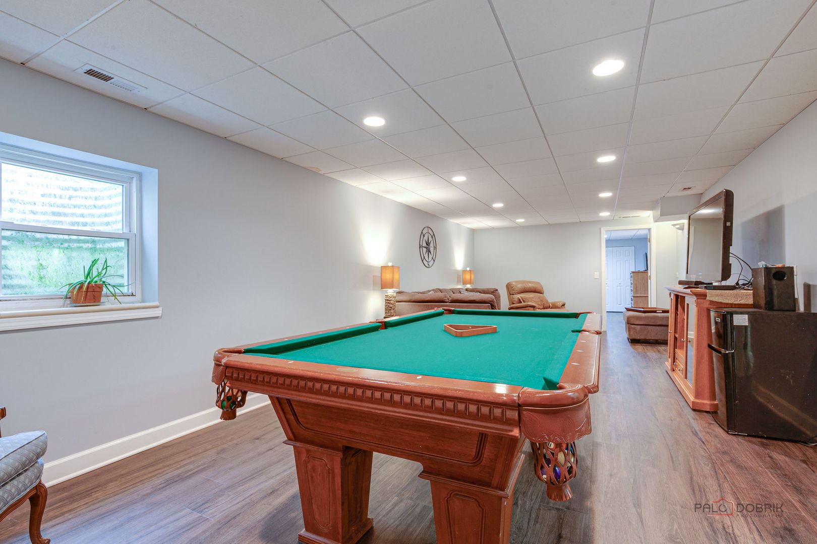 3313 Ridge Road Spring Grove, IL 60081 - Photo 35 of 49 a room with pool table windows and wooden floor