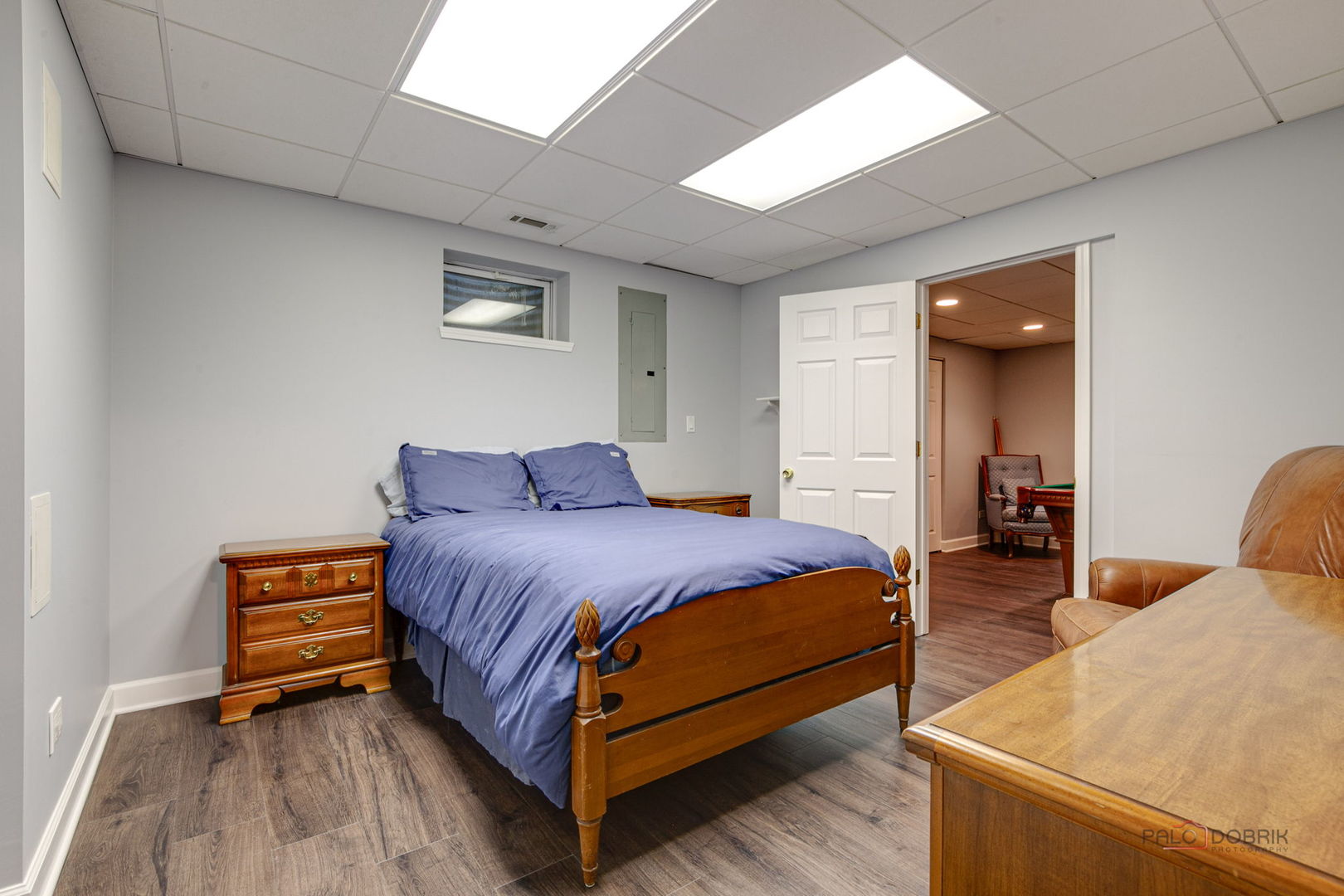 3313 Ridge Road Spring Grove, IL 60081 - Photo 39 of 49 a bedroom with a bed and a lamp with window
