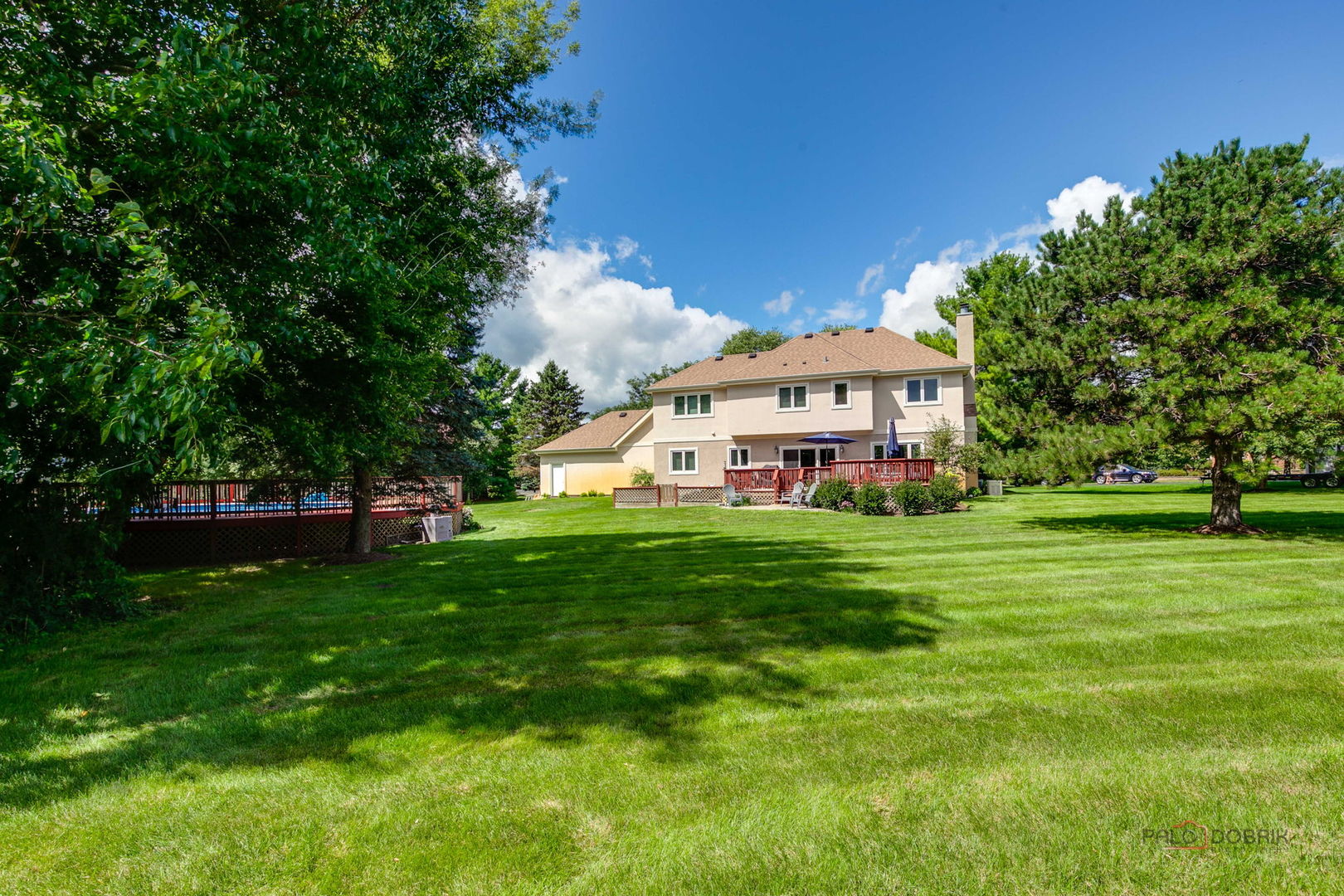 3313 Ridge Road Spring Grove, IL 60081 - Photo 42 of 49 a front view of a house with a yard table and chairs
