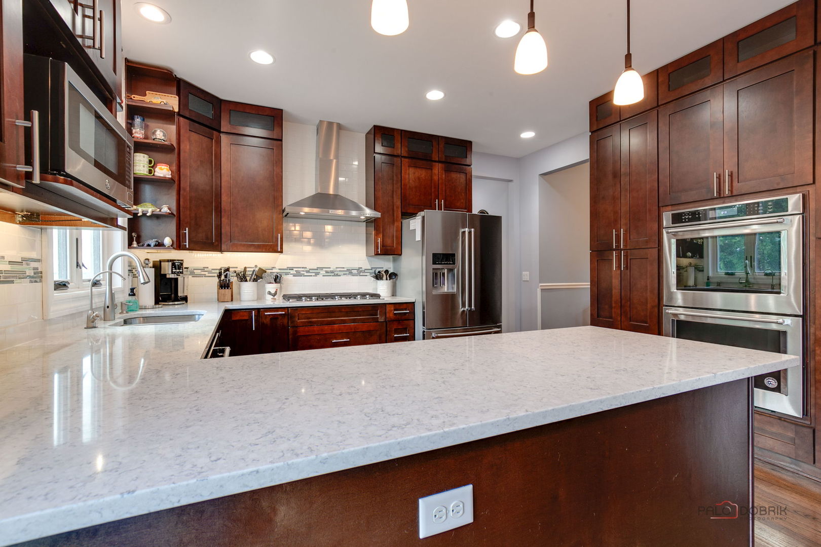 3313 Ridge Road Spring Grove, IL 60081 - Photo 8 of 49 a large kitchen with stainless steel appliances a large counter top