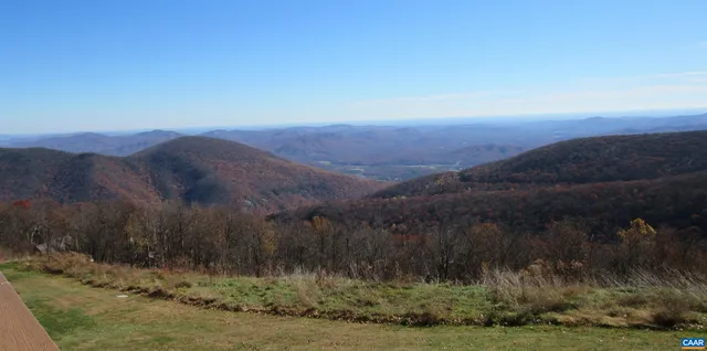 a view of sunset and yard
