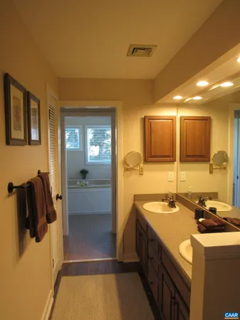 a bathroom with a sink and mirror