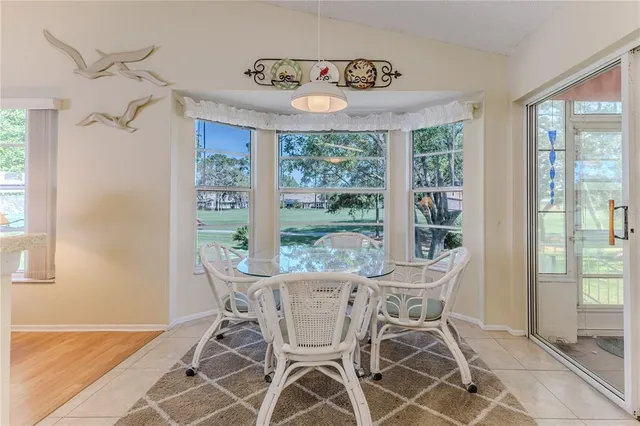 a kitchen with stainless steel appliances a stove a sink and a refrigerator