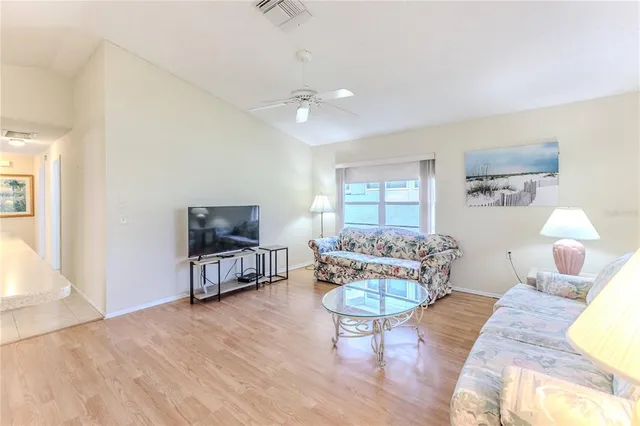 a bathroom with a sink vanity and a mirror