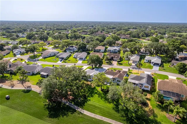a view of storage and utility room with a refrigerator