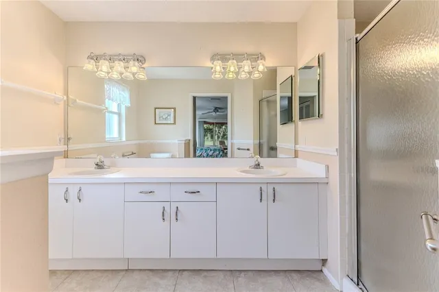 a view of garage with a bike and a car