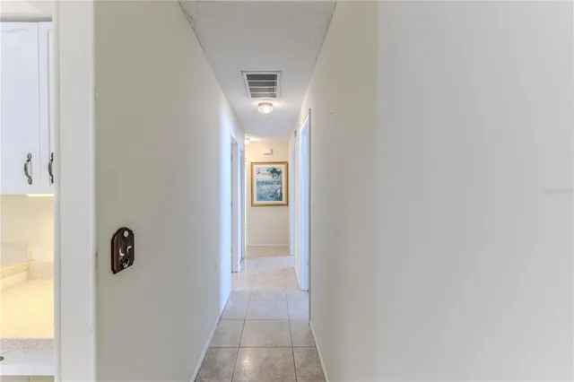 a bedroom with furniture and windows