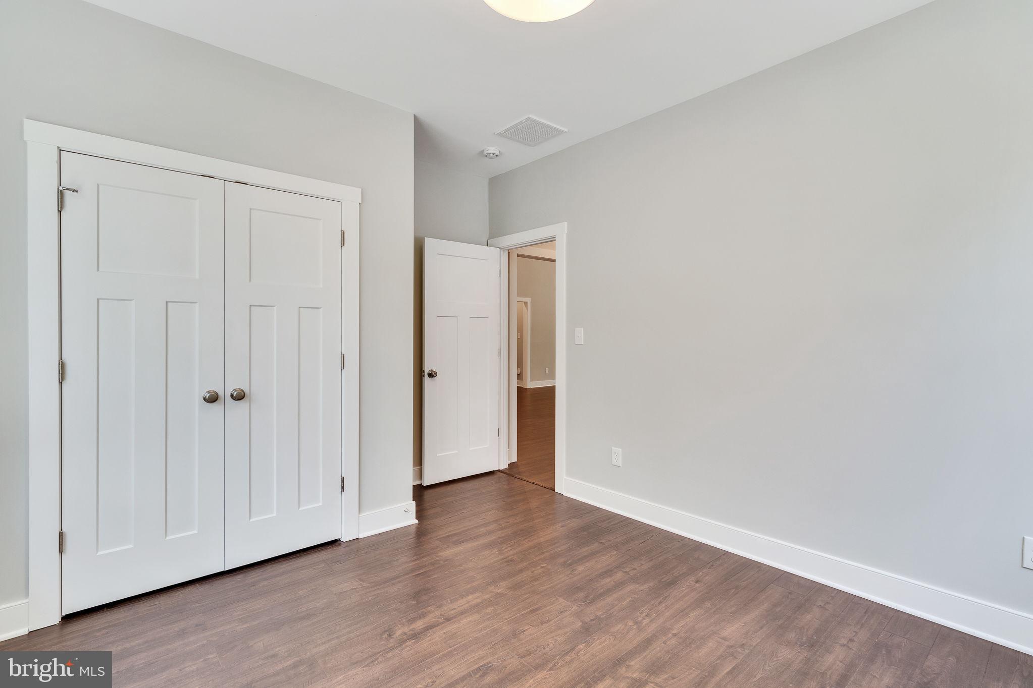 57 Waterman's Way Reedville, VA 22539 - Photo 16 of 43 One of four bedrooms, ceiling light, large closet