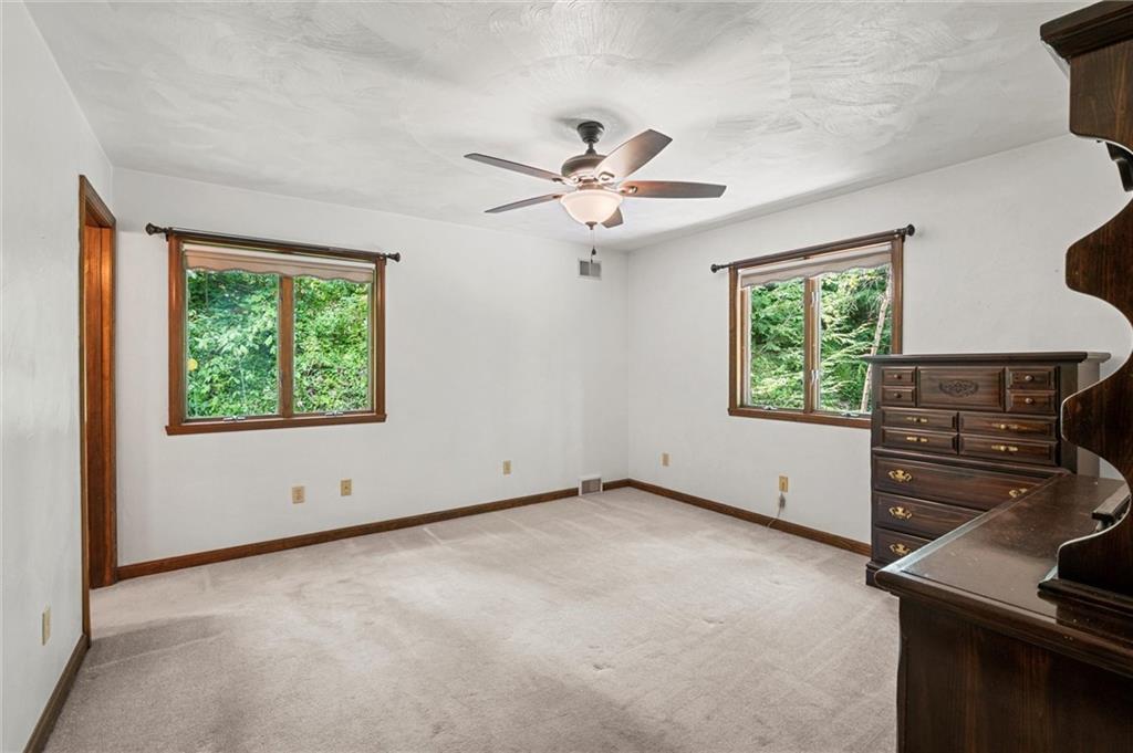 210 Arner Road Freeport, PA 16229 - Photo 13 of 40 a view of room with a ceiling fan and a window