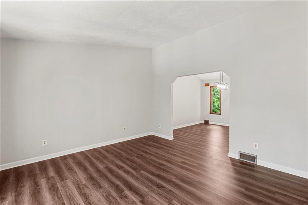 210 Arner Road Freeport, PA 16229 - Photo 6 of 40 a view of an empty room and wooden floor
