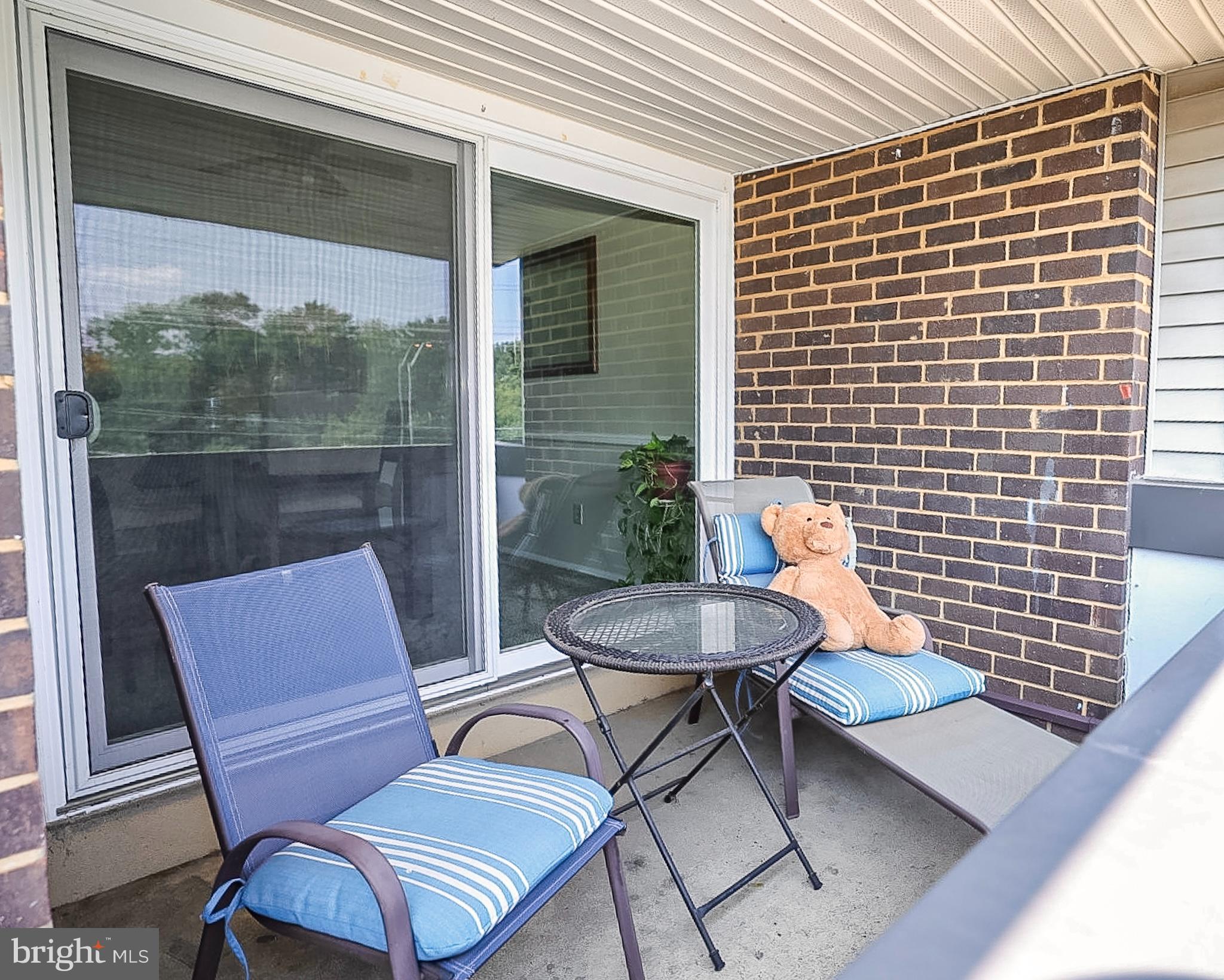 10214 Prince Place, Unit 8202 Upper Marlboro, MD 20774 - Photo 19 of 22 a outdoor view with a sitting space