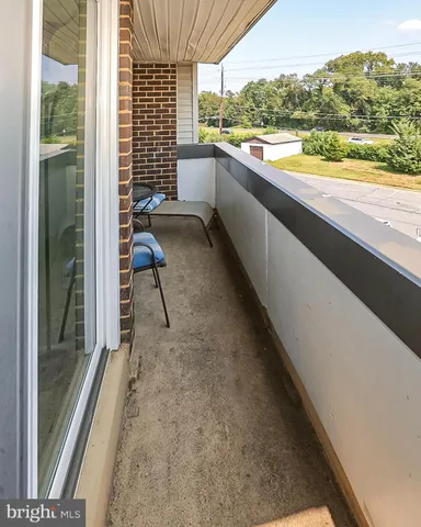 a view of a chairs and table in the terrace