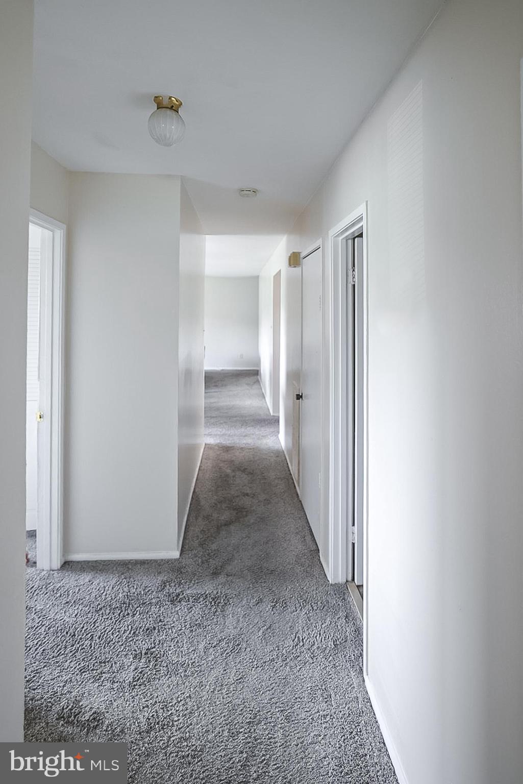 10214 Prince Place, Unit 8202 Upper Marlboro, MD 20774 - Photo 9 of 22 a view of entryway with wooden floor