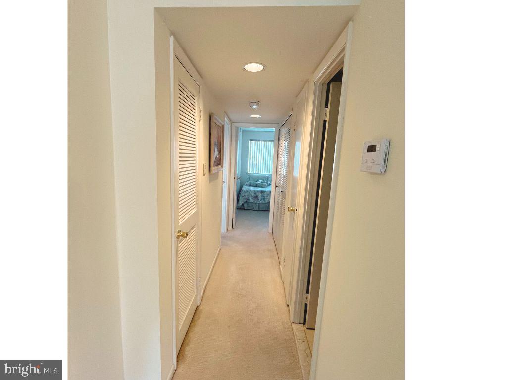9945 Norwalk Road, Unit 11A Philadelphia, PA 19115 - Photo 12 of 30 Hallway to bedrooms