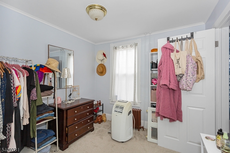 826 Sigsbee Avenue Alpha, NJ 08865 - Photo 12 of 38 a view of walk in closet with clothes