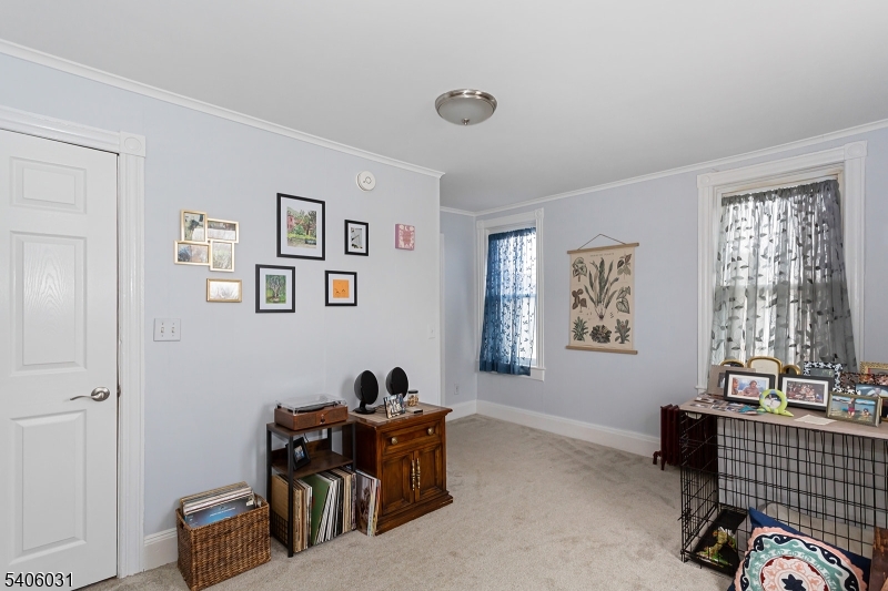 826 Sigsbee Avenue Alpha, NJ 08865 - Photo 17 of 38 a living room with furniture and windows
