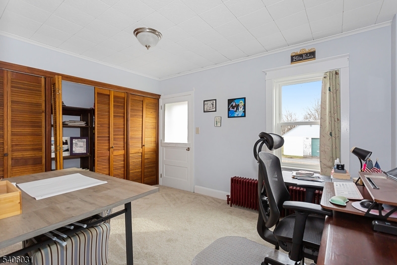 826 Sigsbee Avenue Alpha, NJ 08865 - Photo 21 of 38 a room with furniture and wooden floor