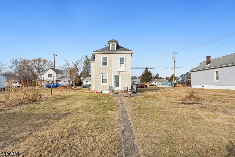 826 Sigsbee Avenue Alpha, NJ 08865 - Photo 30 of 38 a view of a house with a yard