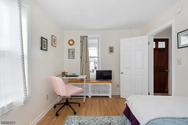 workspace with wooden floor and windows