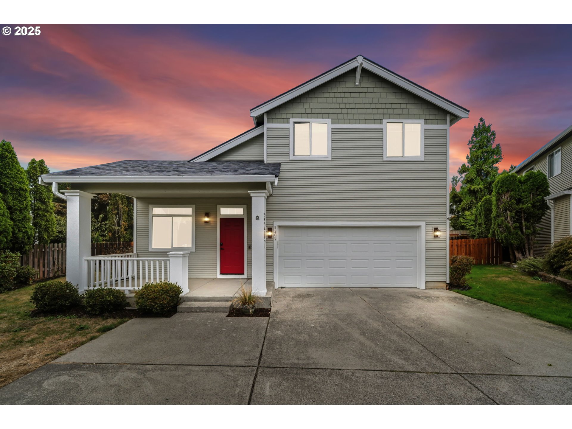 3207 Southeast 194th Court Camas, WA 98607 - Photo 1 of 41 a front view of a house with a yard and garage