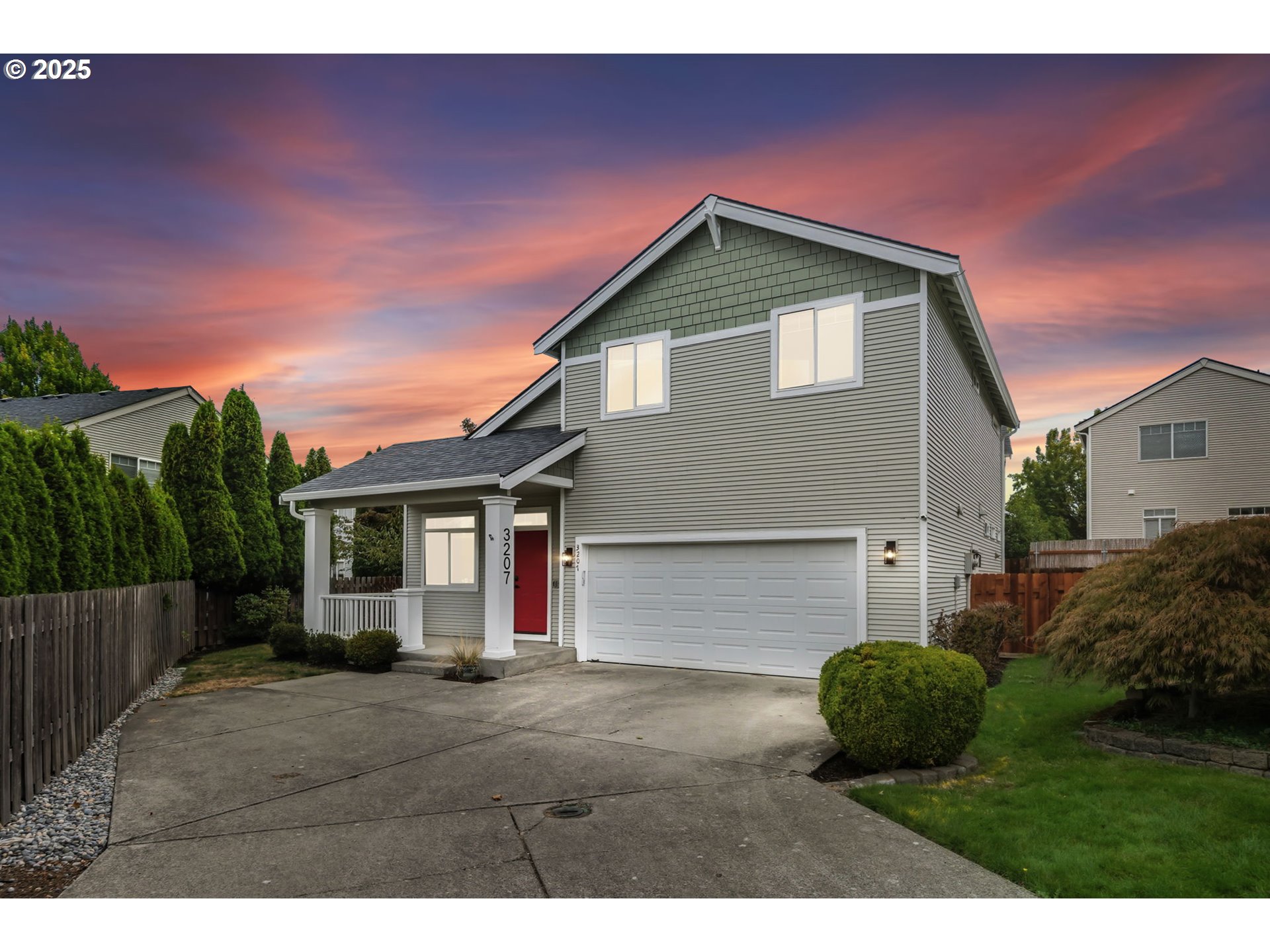 3207 Southeast 194th Court Camas, WA 98607 - Photo 2 of 41 a front view of a house with a garden