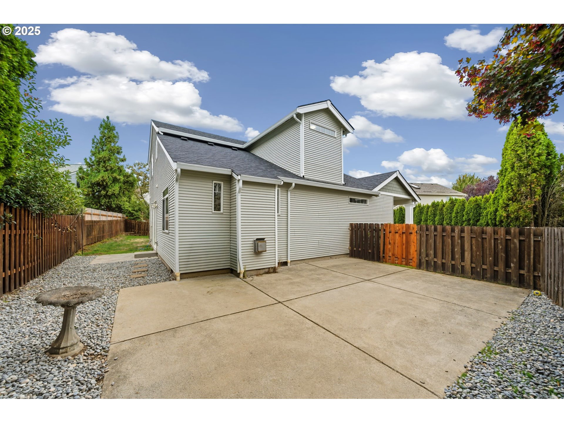 3207 Southeast 194th Court Camas, WA 98607 - Photo 35 of 41 a backyard of a house with table and chairs