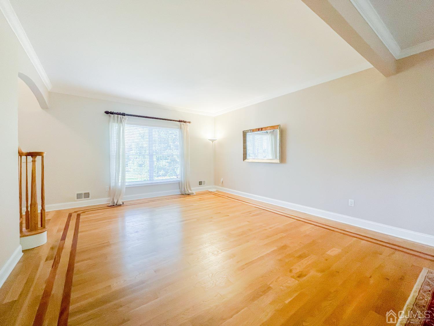 11 Edgebrook Road New Brunswick, NJ 08901 - Photo 16 of 42 a view of empty room with wooden floor and fan