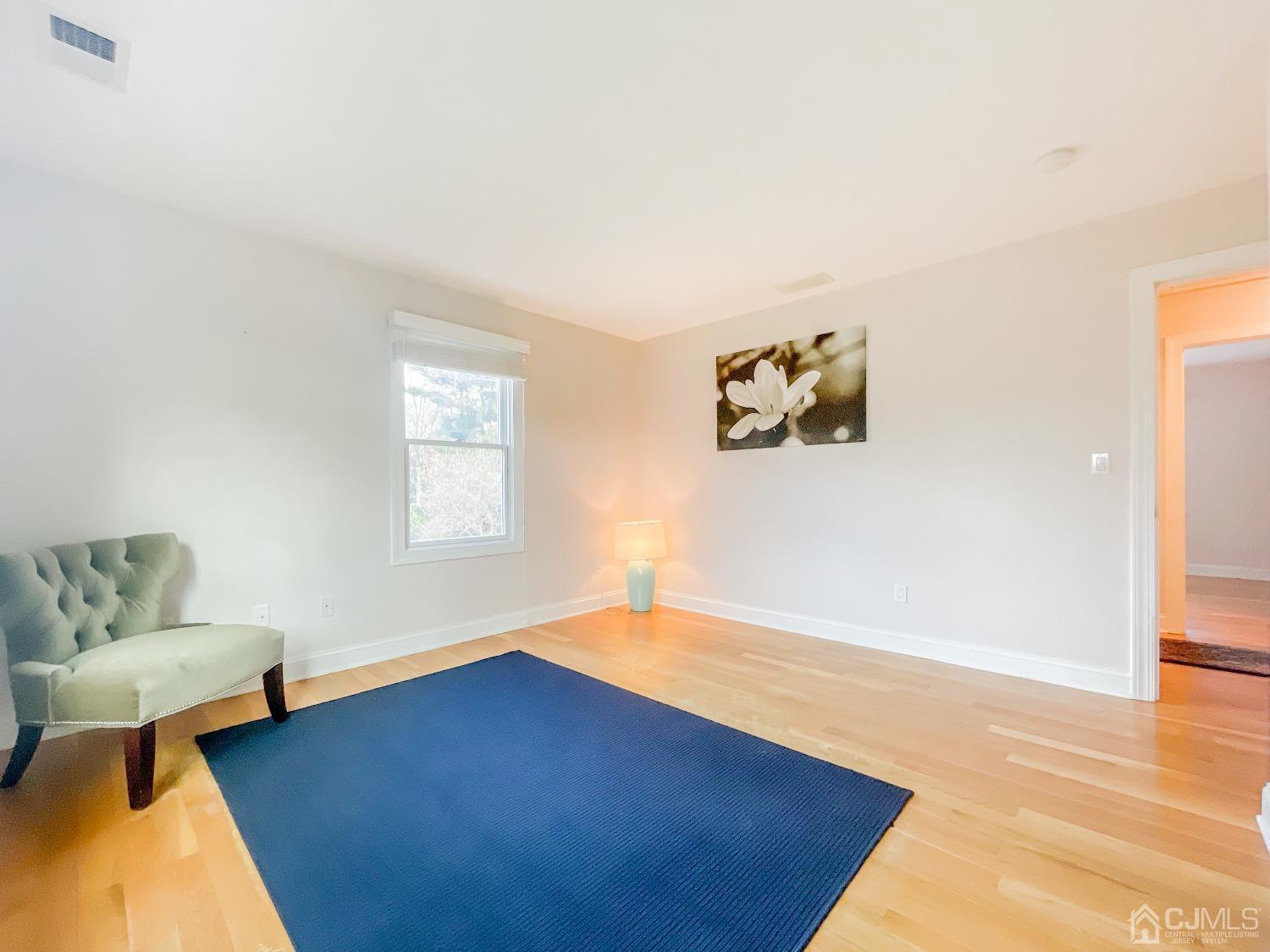 11 Edgebrook Road New Brunswick, NJ 08901 - Photo 41 of 42 a view of livingroom with furniture and wooden floor