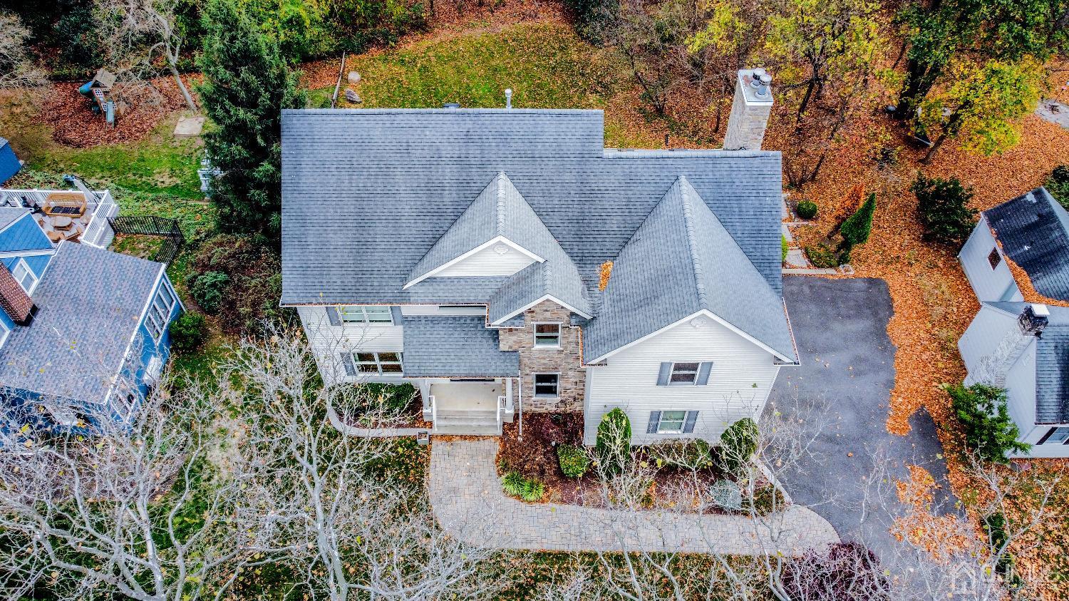 11 Edgebrook Road New Brunswick, NJ 08901 - Photo 5 of 42 an aerial view of a house with a yard and sitting area
