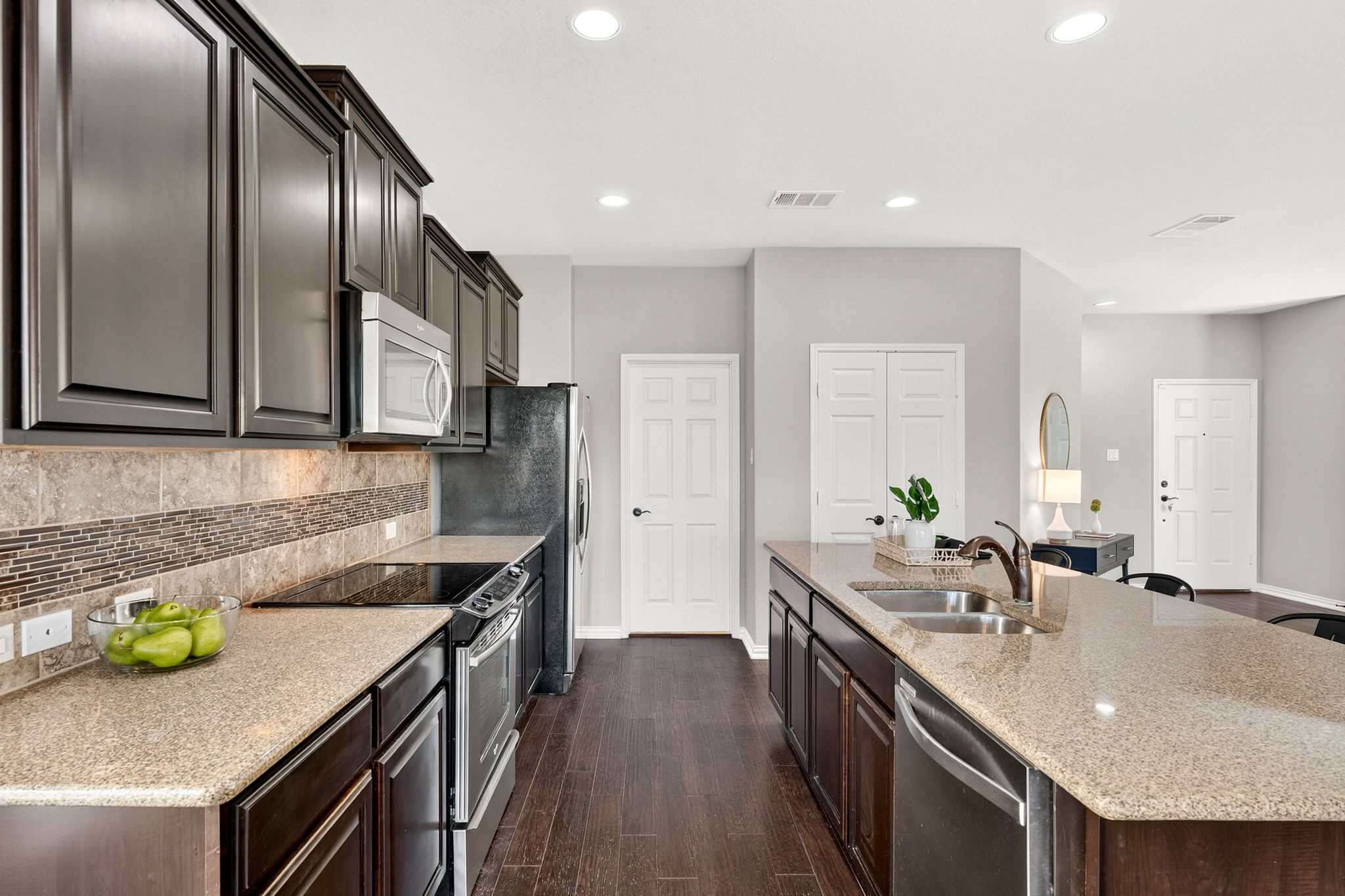 9932 Wading Pool Path Austin, TX 78748 - Photo 11 of 28 Stainless steel appliances complete this kitchen.