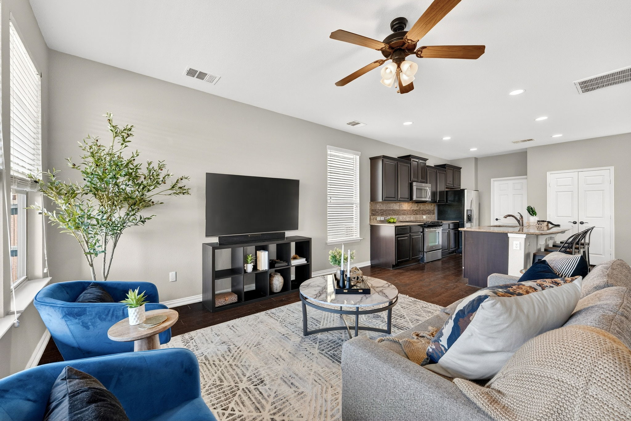 9932 Wading Pool Path Austin, TX 78748 - Photo 6 of 28 Whether you are prepping snacks at the island or catching the game, you’re always part of the conversation.