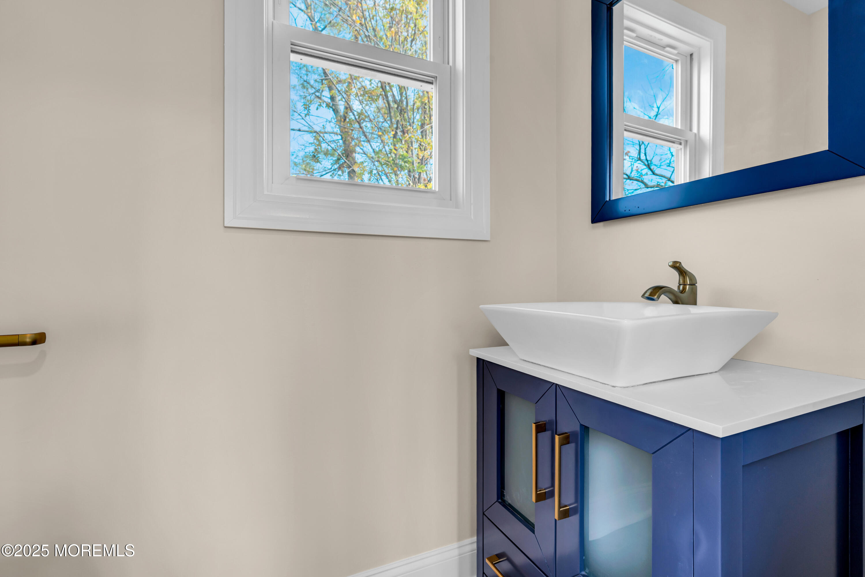 1900 Main Street Belmar, NJ 07719 - Photo 10 of 20 a bathroom with a sink and a mirror