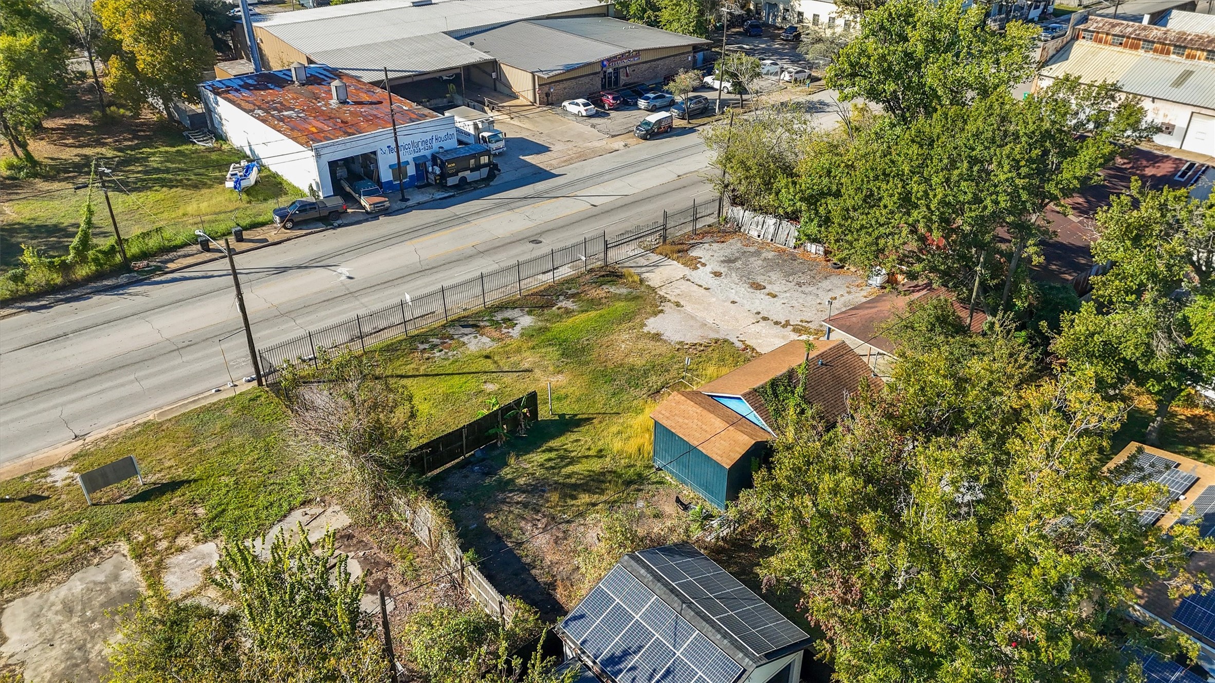 7137 Navigation Boulevard Houston, TX 77011 - Photo 8 of 13 an aerial view of residential house with swimming pool