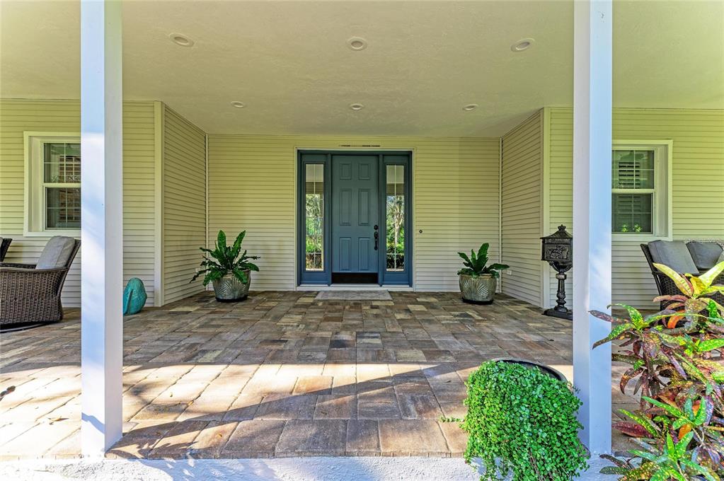 39321 Washington Loop Road Punta Gorda, FL 33982 - Photo 11 of 98 a view of entryway front of a house