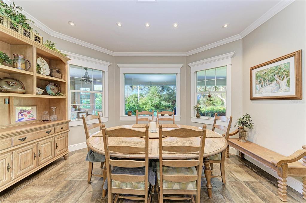 39321 Washington Loop Road Punta Gorda, FL 33982 - Photo 26 of 98 a dining room with furniture and window